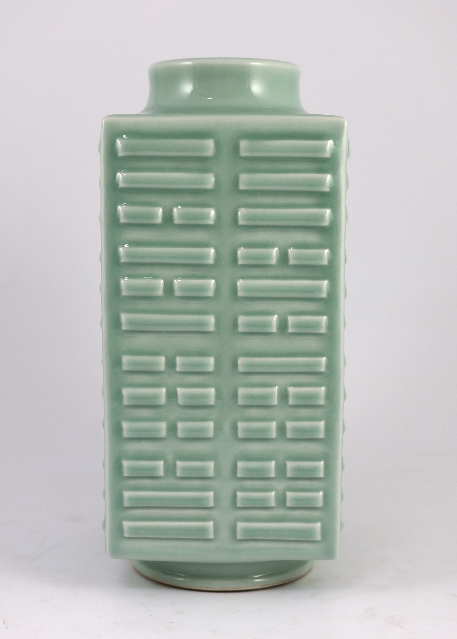 A Chinese celadon glazed ‘eight trigrams’ square vase, cong, Guangxu six character mark probably later, 30cm high